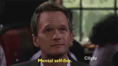 a man in a suit and tie says mental self-five