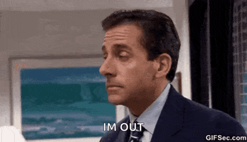 a man in a suit and tie is making a funny face and says `` im out '' .