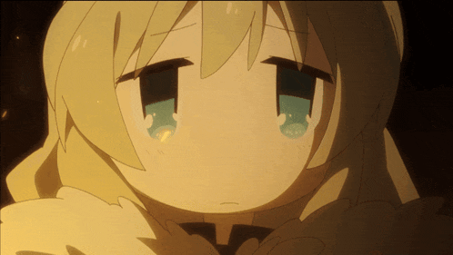 a close up of a cartoon character 's face with tears coming out of her eyes