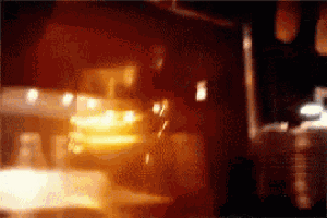 a blurred image of a car driving down a street
