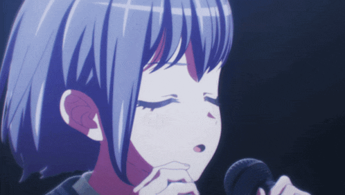a blue haired anime girl singing into a microphone