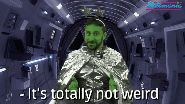 a picture of a man with a green face and the words it 's totally not weird on the bottom