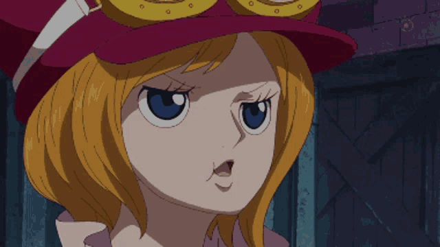 a close up of a cartoon character wearing a red hat and goggles