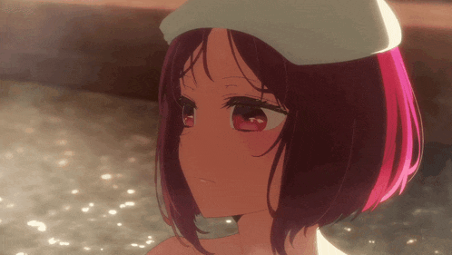 a girl with red hair wearing a towel on her head