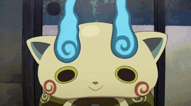 a cartoon cat with a blue swirl on its head is smiling