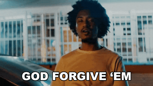 a man is standing in front of a car and says god forgive em