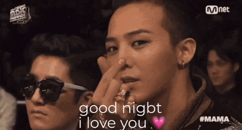 a man holding his nose with the words good night i love you