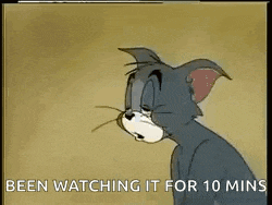 a cartoon cat is looking at a watch and says `` been watching it for 10 minutes '' .