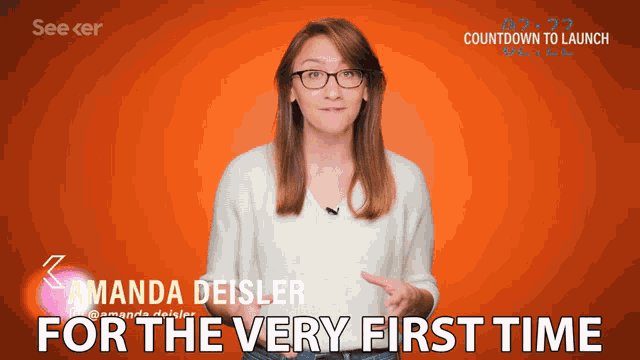 a woman wearing glasses stands in front of an orange background with the words " amanda deisler for the very first time " below her
