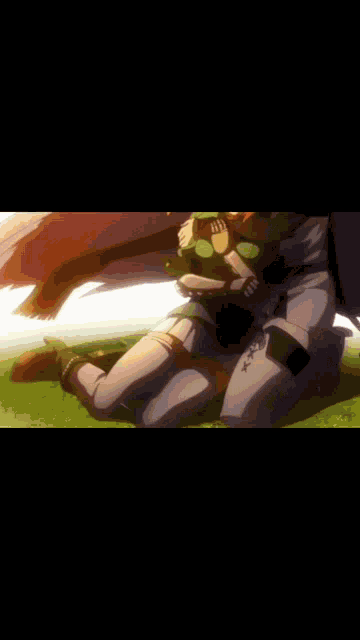 a man and a woman are hugging each other in a field