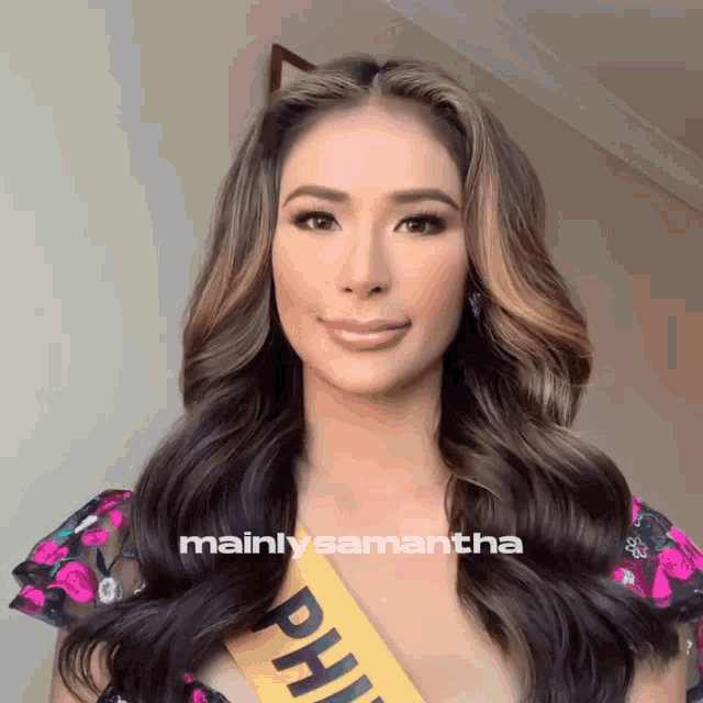 a woman is wearing a sash that says mainlysamantha