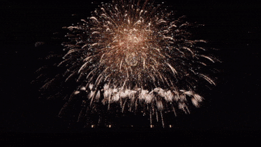 a fireworks display that looks like a face with eyes