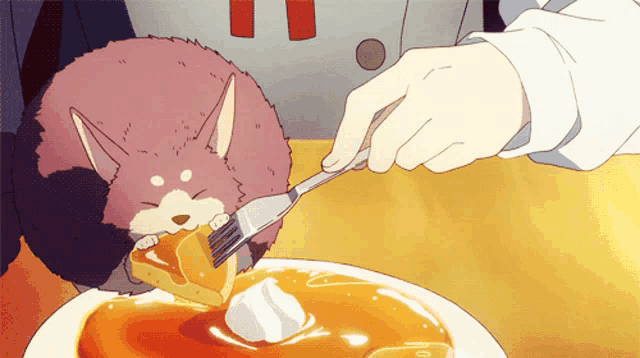 a cat is eating a piece of cake with whipped cream