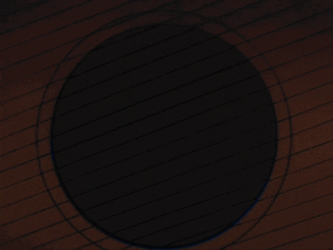 a blue circle on a wooden surface that looks like a door