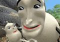 a close up of a cartoon character making a funny face while holding a baby .