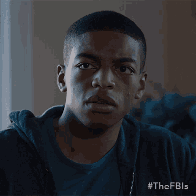 a close up of a young man 's face with the hashtag #thefbls on the bottom