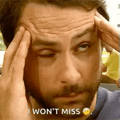 a man with a beard is holding his head with his hands and says `` i won 't miss '' .
