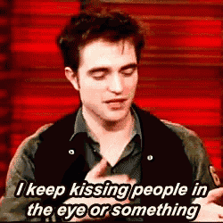 a man is saying that he keeps kissing people in the eye or something .