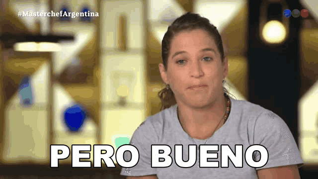 a woman says " pero bueno " in front of a blurry background
