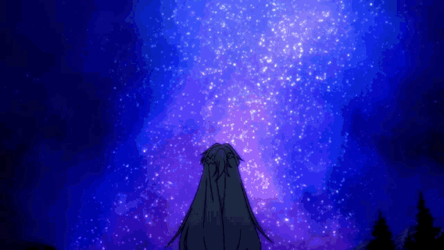 a person looking up at a purple and blue starry sky