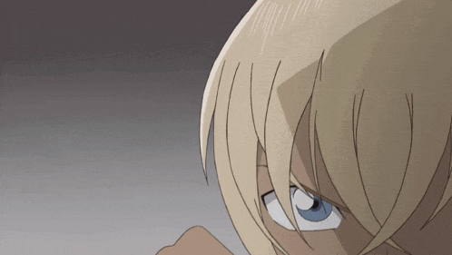 a close up of a cartoon character 's face with blue eyes
