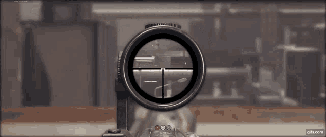 a close up of a sniper scope with the website gifx.com at the bottom right