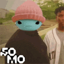 a man wearing a pink hat and a blue mask is standing next to a man wearing a black jacket .