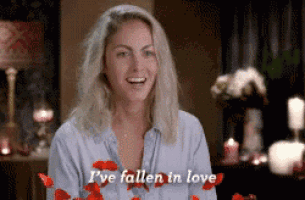 a woman says i 've fallen in love in front of candles