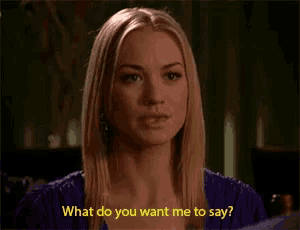 a woman in a purple dress asks what do you want me to say