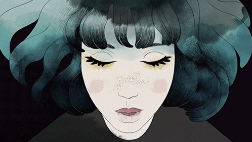 a close up of a woman 's face with closed eyes