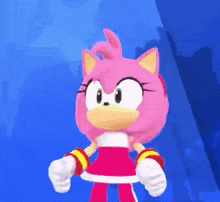 amy rose from sonic the hedgehog is giving a thumbs up .