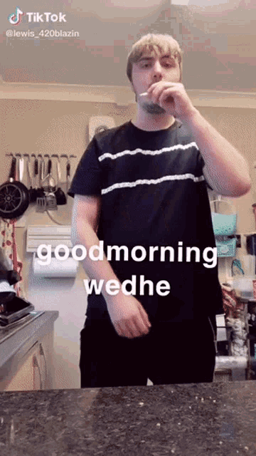 a man brushing his teeth in a kitchen with the words good morning wedne