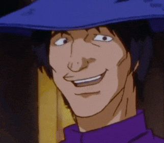 a man wearing a blue hat and a purple shirt smiles