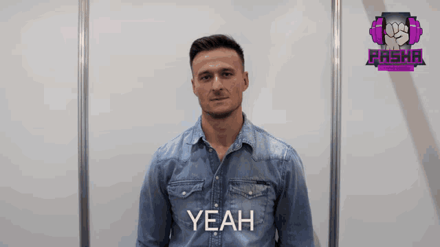 a man in a denim shirt says yeah