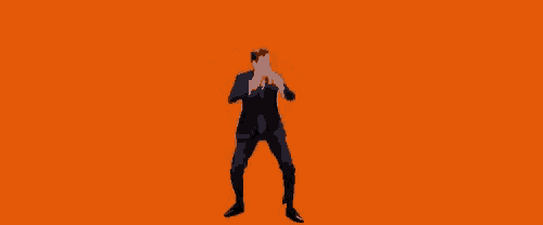 a man in a suit and tie is jumping in the air .