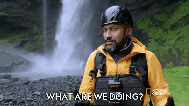 a man standing in front of a waterfall with the words what are we doing