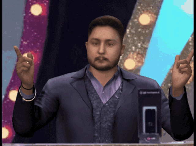 a man in a suit is giving a speech with his fingers up