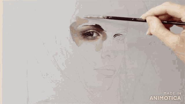 a person is painting a woman 's face with a brush and the words made in animotica are visible