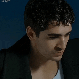 a close up of a man 's face with a blue background and the words mind gif below it