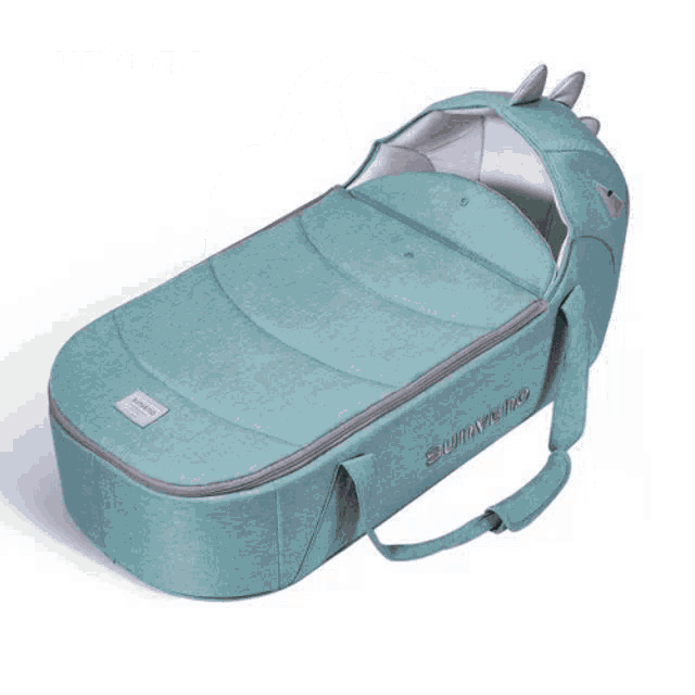 a green sunveno diaper bag with three pink bottles inside