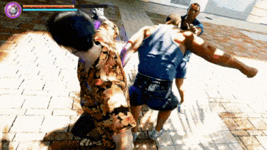 a man in a floral shirt is being punched in the face