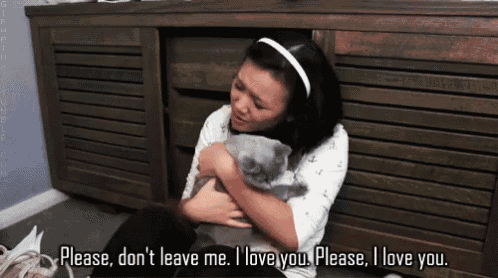 a woman holding a cat with the words please don t leave me i love you please i love you