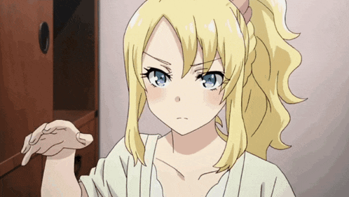 a blonde anime girl with a ponytail and blue eyes looks angry
