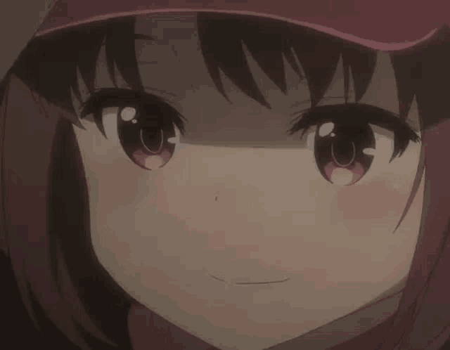 a close up of a girl 's face with a surprised look