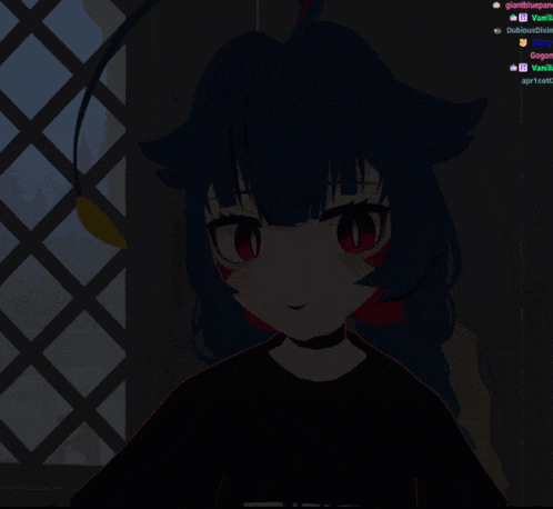 a girl in a black shirt giving a thumbs up in a dark room