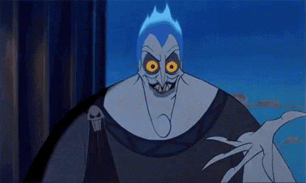 a close up of a cartoon character with blue hair and yellow eyes