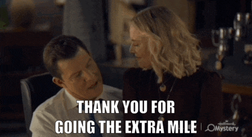 a man and a woman are looking at each other with the words thank you for going the extra mile written below them