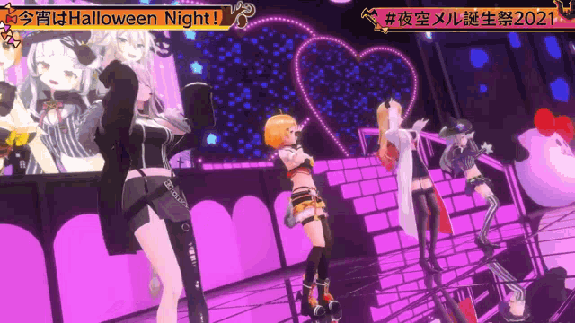 a group of anime girls dancing on a stage with the words halloween night written above them