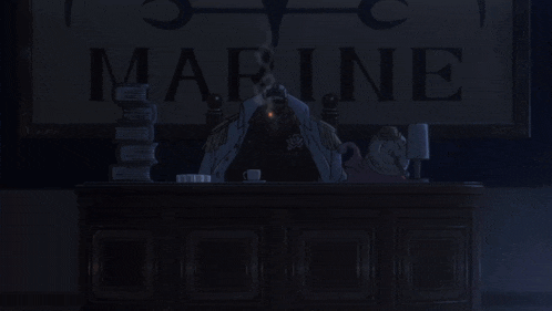 a man wearing a hat that says marine looks angry