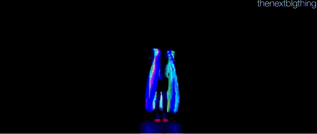 a glow in the dark image of a person with the words thenextbigthing below them